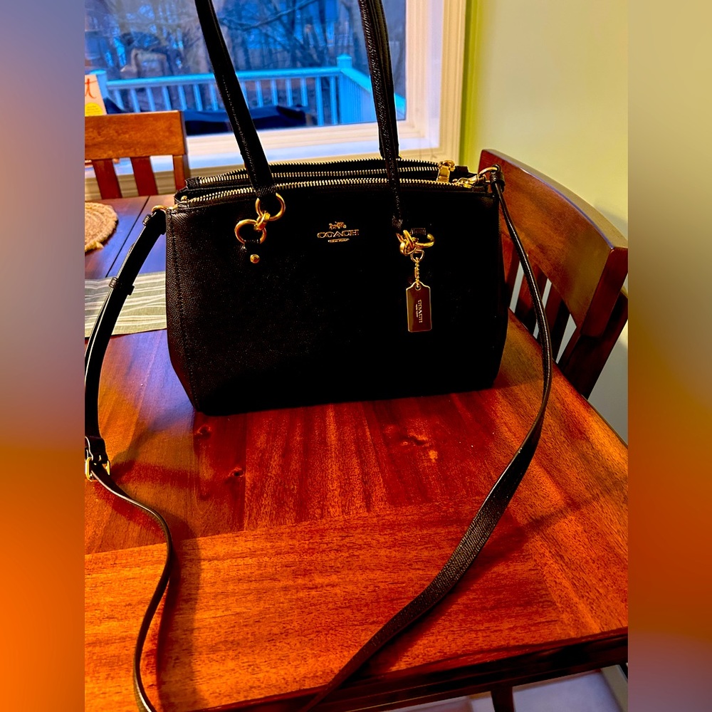Black Coach Purse - handles and comes with shoulder strap.